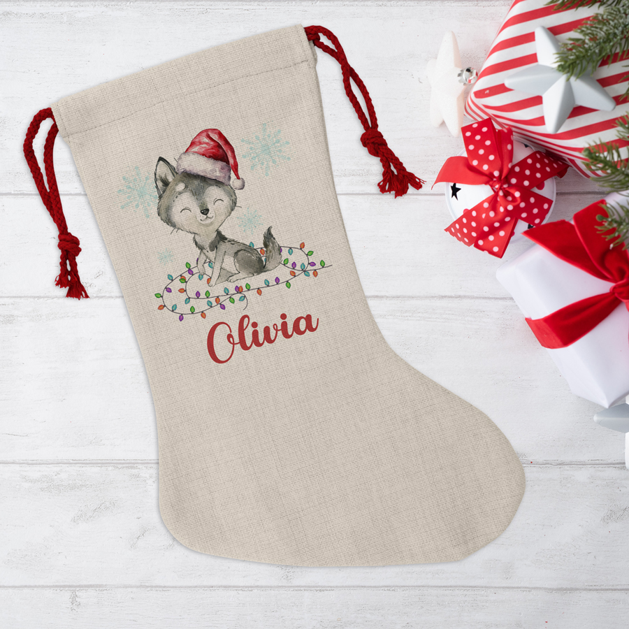 Personalised Christmas stocking featuring a cute wolf.