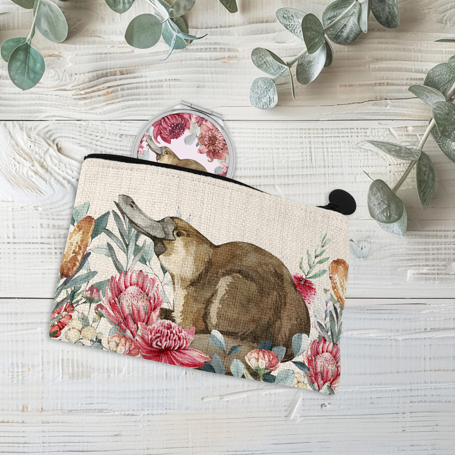 Platypus coin purse and compact mirror.