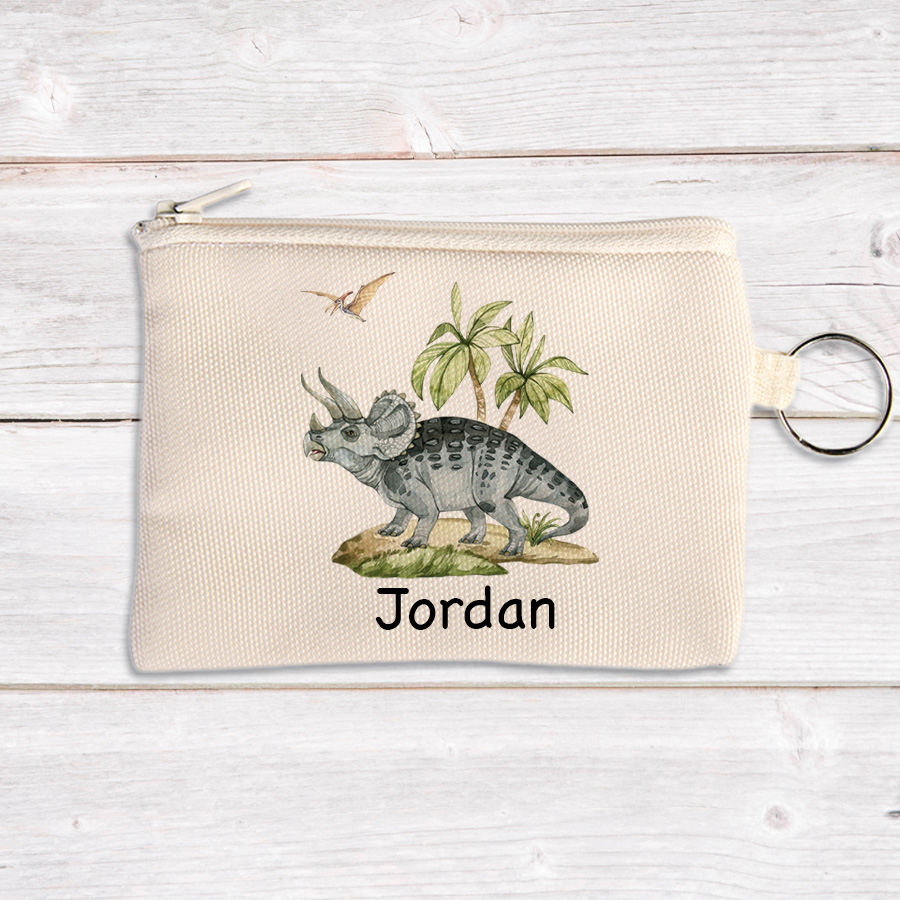 Personalised coin pouch featuring a Triceratops.