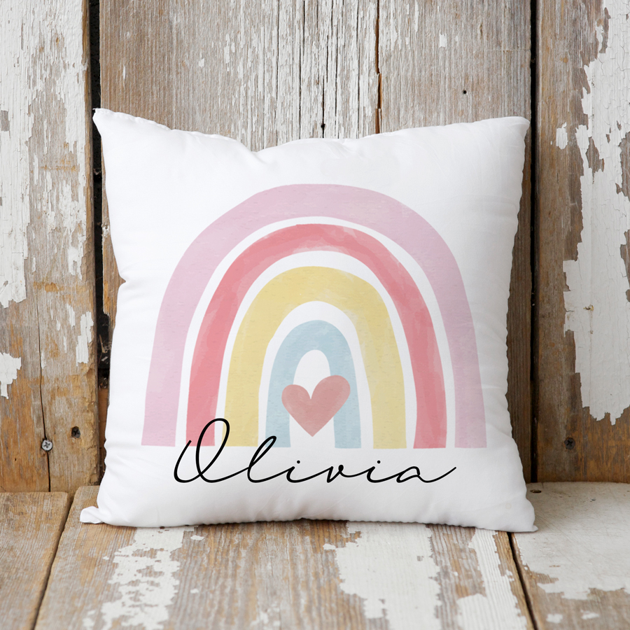 Personalised cushion featuring a rainbow.