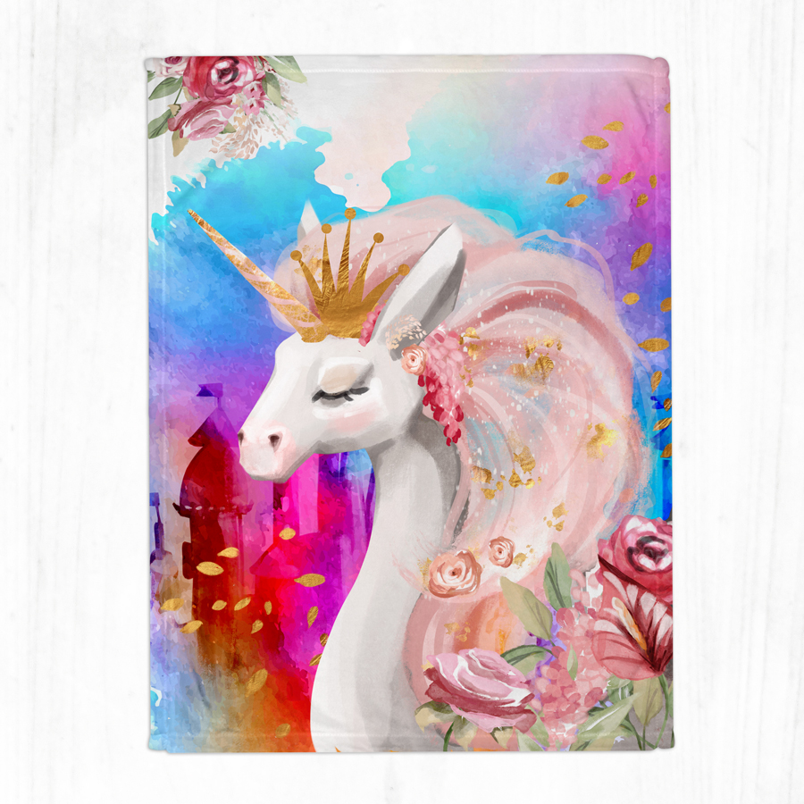 Colourful baby blanket featuring a unicorn.