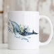 Ceramic mug featuring a dolphin.