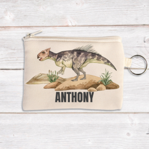 Personalised dinosaur coin pouch featuring featuring a helioceratops.