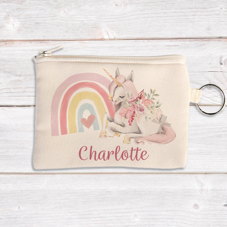 Personalised coin pouch featuring a unicorn and rainbow.
