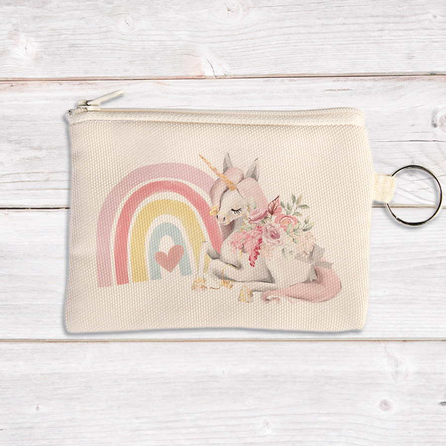 Coin pouch featuring a unicorn and rainbow