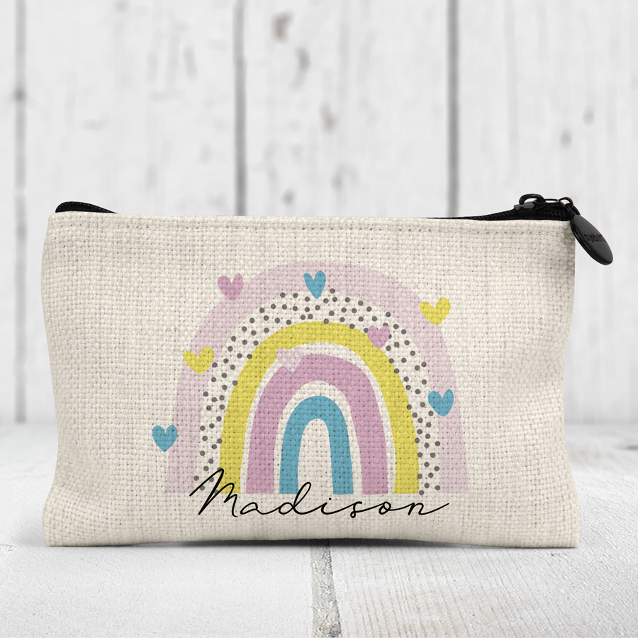 Rainbow and hearts on a personalised coin purse.