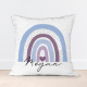 Personalised sequin cushion featuring a blue rainbow.