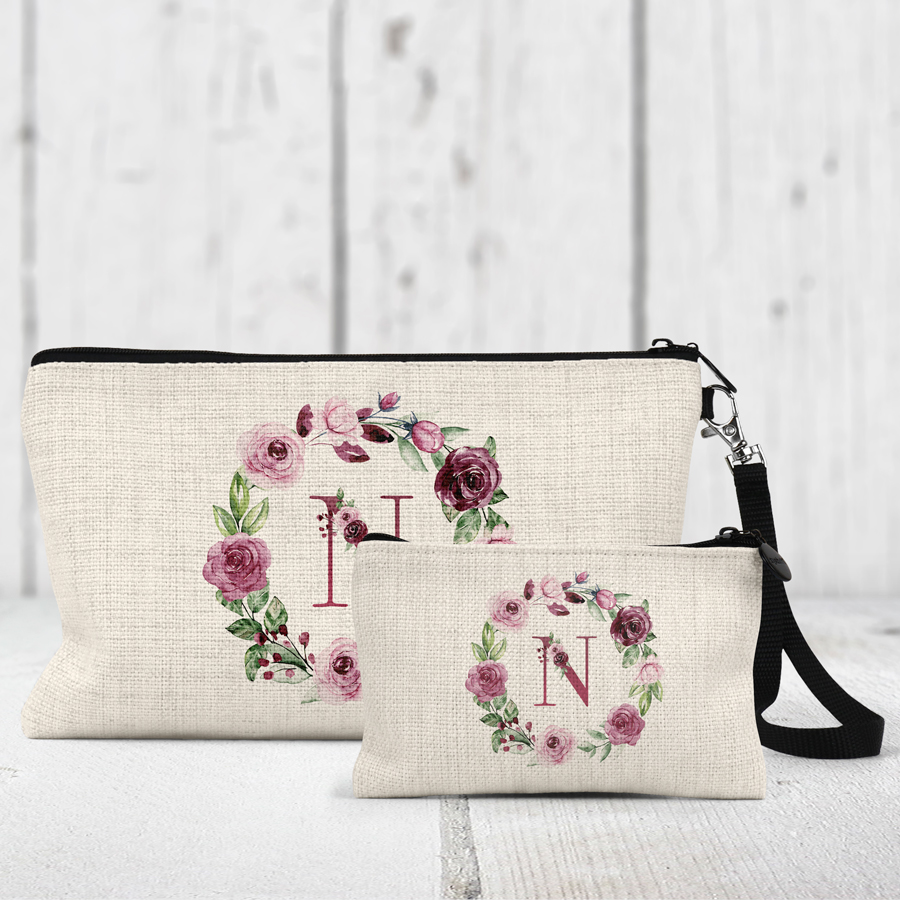Linen coin purse and makeup bag featuring a pink rose wreath and initial.